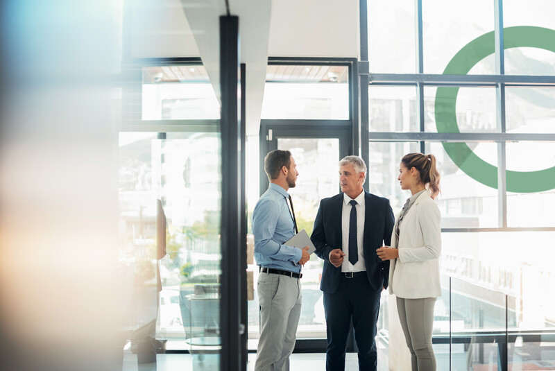 Group of colleagues having informal conversation